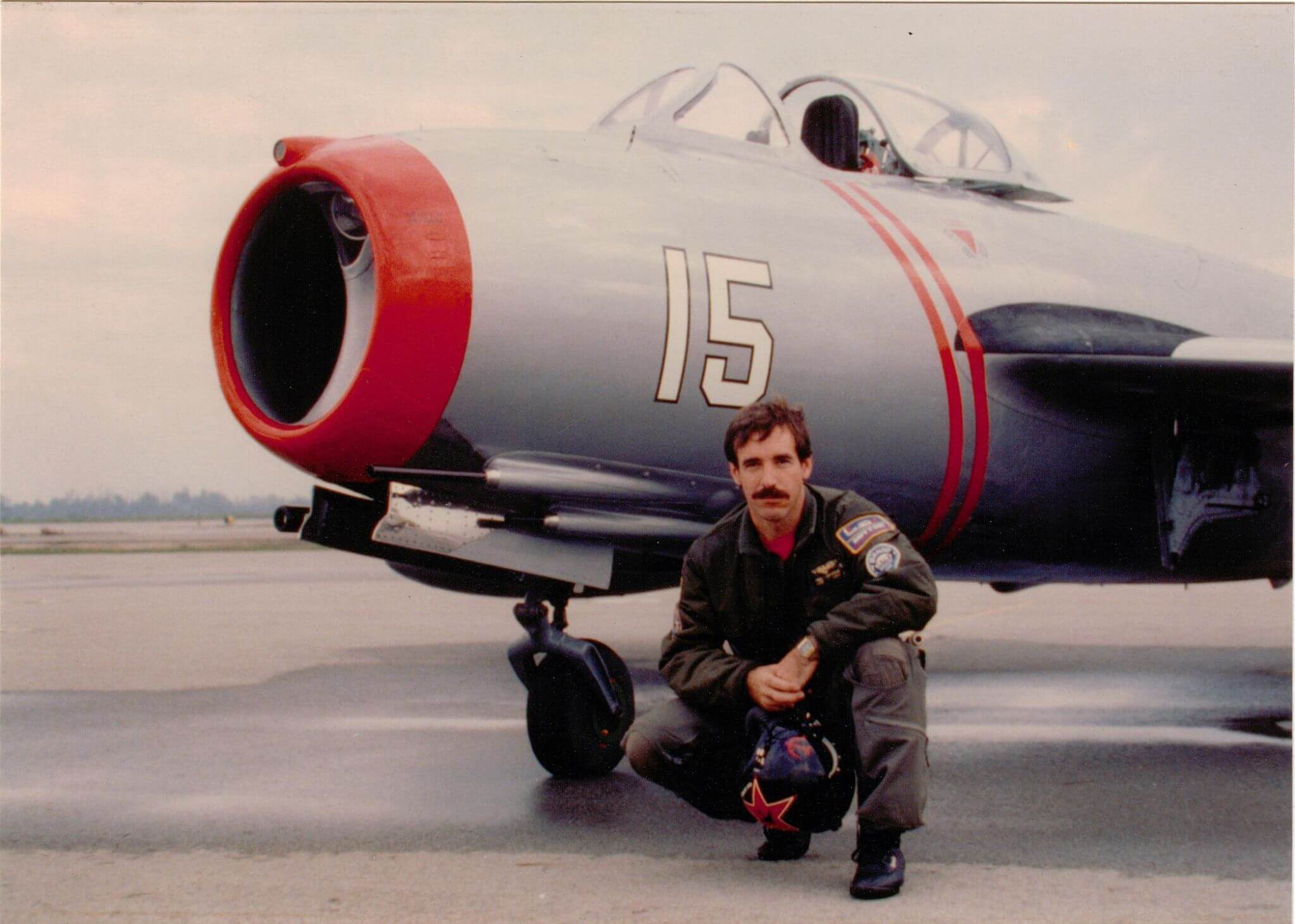 Paul Entrekin, Author of Mr. MiG-15, posing with his MiG on the ramp